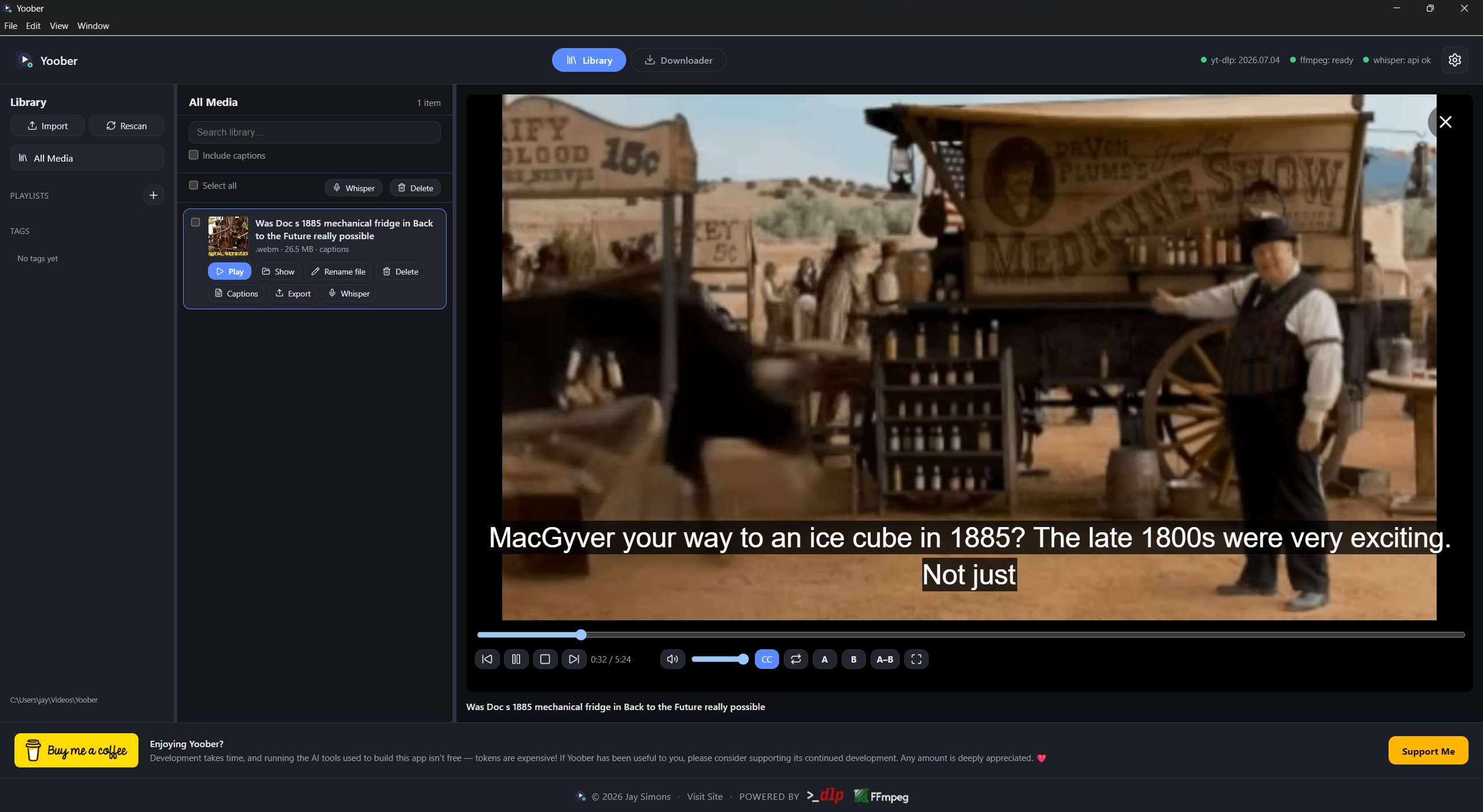 Yoober desktop application showing a local video library, in-app playback, closed captions, and transcription controls